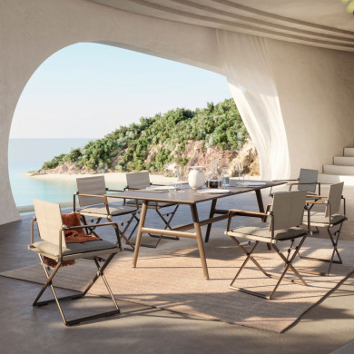 Fauteuil SEAX accoudoirs bois marin Dedon