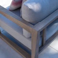 SKAAL club armchair with light grey Sunbrella cushions Les Jardins